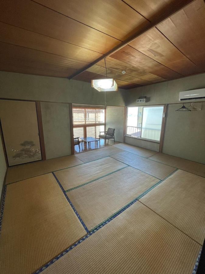 素泊まり民宿とみや Oshima Bagian luar foto