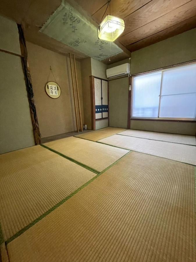 素泊まり民宿とみや Oshima Bagian luar foto