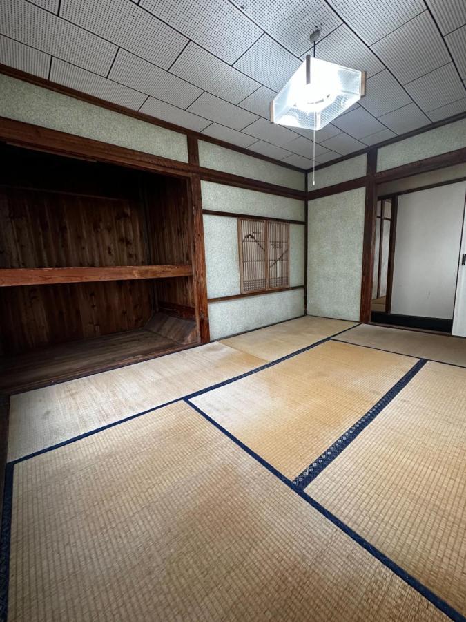 素泊まり民宿とみや Oshima Bagian luar foto