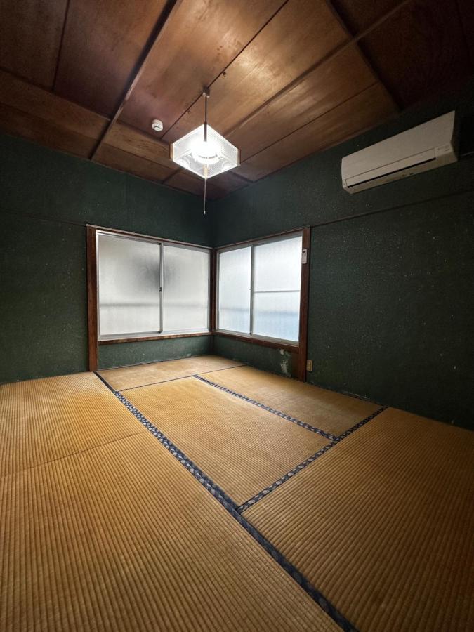 素泊まり民宿とみや Oshima Bagian luar foto